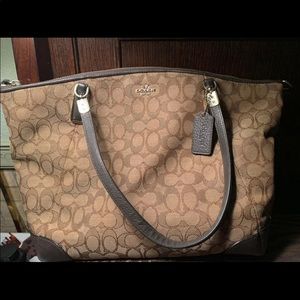 Brown/tan signature coach